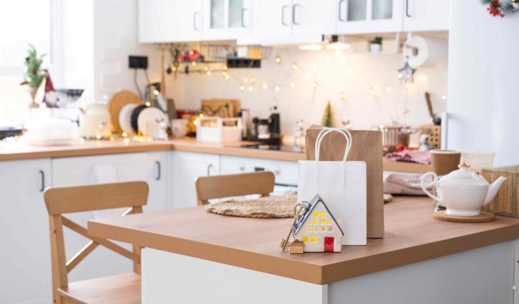 ceramic home on kitchen counter in brightly lit kitchen
